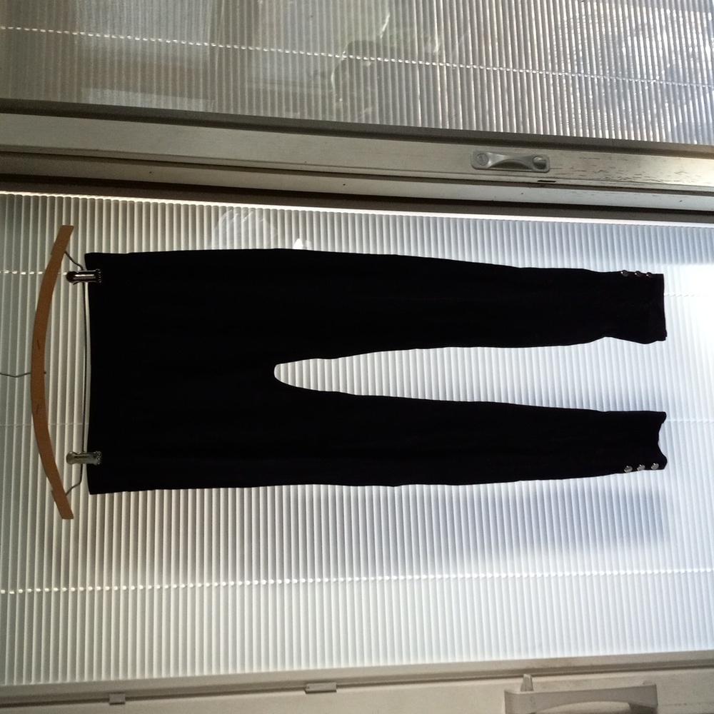 Girls xl black legging with3 silver buttons on the bottom of each leg